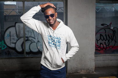 Full Zip Hoodie Mockup Featuring a Cool Man in an Abandoned Building 24325