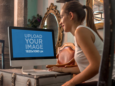 Saleswoman at a Vintage Store Using an iMac Mockup