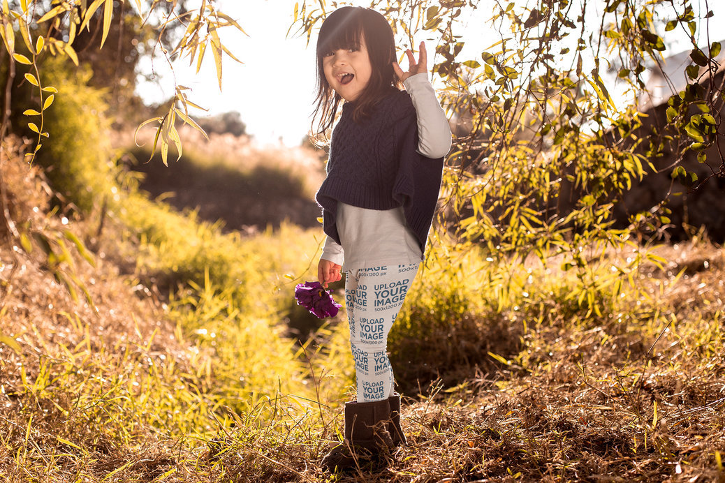 Mockup of a Little Girl Wearing Leggings Outdoors