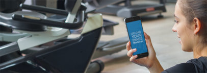 Young Woman Using iPhone 6 at the Gym Mockup