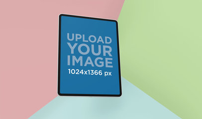 Mockup of an iPad Pro Floating Against a Tri-Color Backdrop 24467