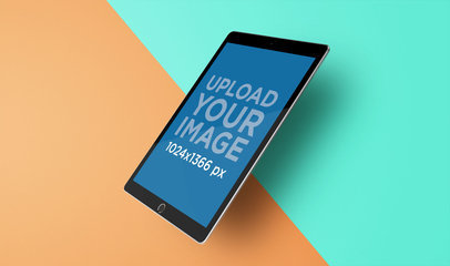 Angled iPad Pro Mockup Featuring a Diagonally Divided Colorful Backdrop