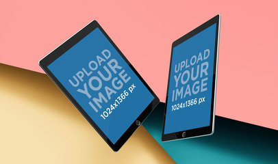 Mockup of Two iPads Floating over a Three Colored Background