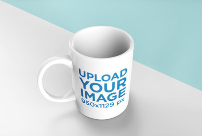 Mockup of a Coffee Mug Standing over a Surface with Two Colors