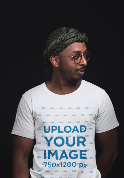 T-Shirt Mockup of a Man in a Turban Standing in a Studio 21052