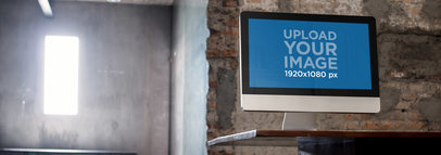 Desktop Mockup Featuring an iMac at an Architecture Office