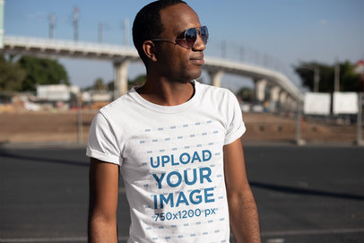 T-Shirt Mockup of a Man Looking at the Horizon