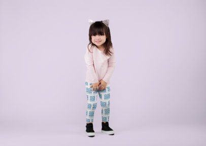Leggings Mockup of a Little Girl Standing in a Studio Set 23926