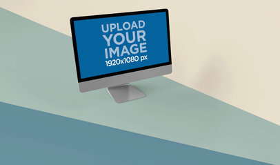 Mockup of an iMac Standing on a Tricolor Surface