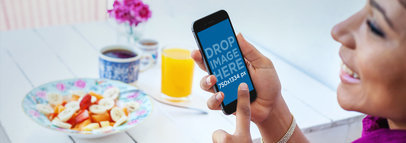 iPhone 6 Mockup Template of a Lady Having Breakfast