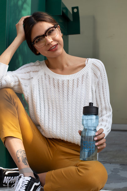 Water Bottle Mockup of a Woman Wearing Cool Retro Glasses