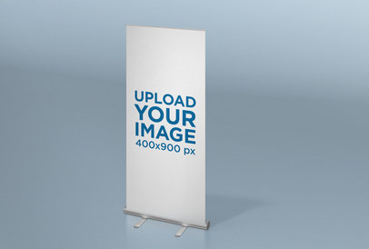Roll-Up Banner Mockup Featuring a Space with a Solid Color 24517