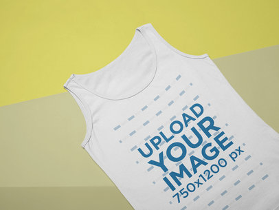 Flat Lay Mockup of a Tank Top Over a Colored Surface