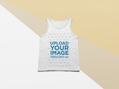 Studio Mockup of a Raglan Tank Top Lying on a Flat Surface