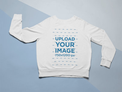Mockup of a Sweatshirt over Colored Cardboard Paper 24574