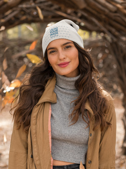 Mockup of a Smirking Woman Wearing a Beanie and a Cropped Sweater 24604
