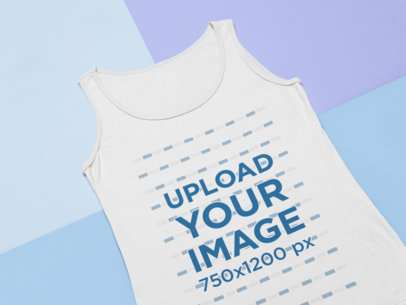 Mockup of a Tank Top Lying Over a Surface with Three Different Colors 24743