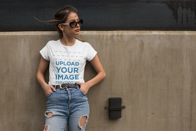 T-Shirt Mockup Featuring a Cool Young Woman Wearing High Rise Jeans 