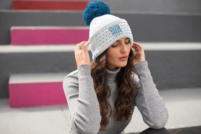 Beanie Mockup Featuring a Handsome Woman with a Winter Outfit