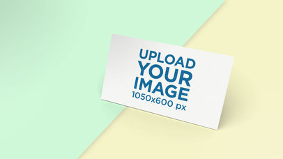 Business Card Mockup over a Colored Surface