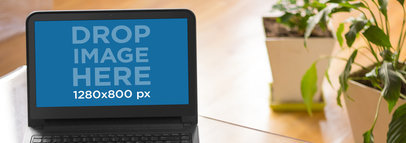 Laptop Mockup Template of a Dell Inspiron at a Home Office Environment a5446