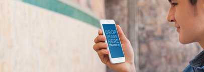 iPhone Mockup of a Young Man Holding an iPhone 6 a5711