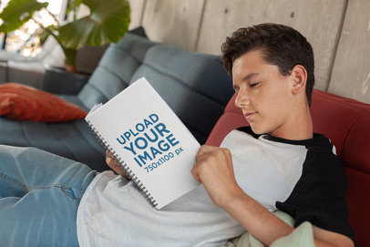 Notebook Mockup of a Young Boy Reading