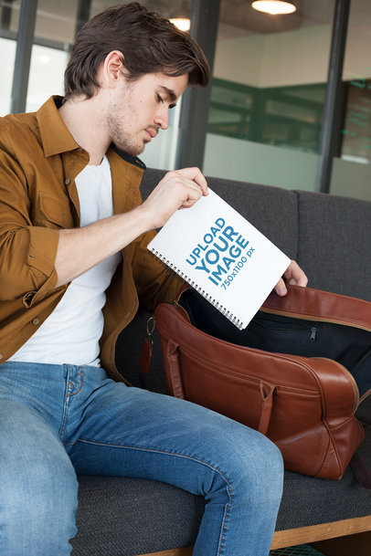 Mockup of a Man Putting Away His School's Notebook