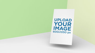 Mockup of a Vertical Business Card Floating on a Multicolor Surface 25041