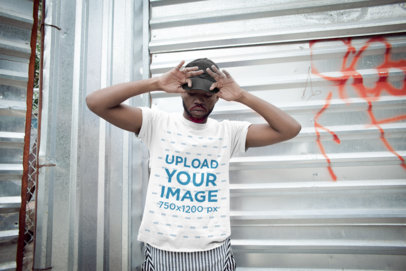 Mockup of a Cool Man with a Red Beard Wearing a T-Shirt and a Cap