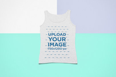 Mockup of a Heathered Tank Top Lying Flat over a Colorful Surface
