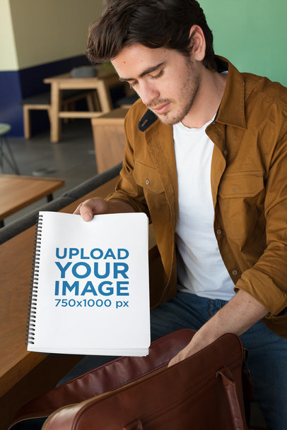 Mockup of a Man Taking a School Notebook from His Bag 24159
