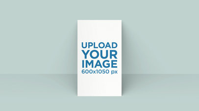 Mockup of a Vertical Business Card Leaning on a Solid Surface