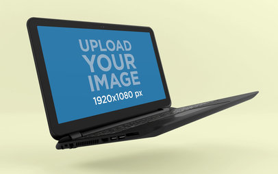 Mockup of a Laptop Floating Angled over a Solid Colored Room 25058