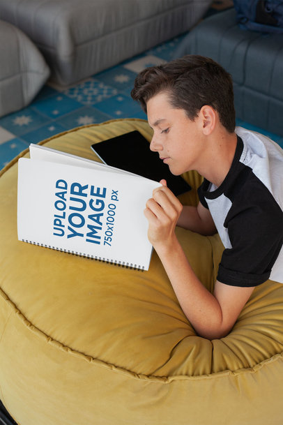 School Notebook Mockup of a Boy Reading 24143