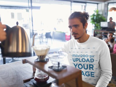 Crewneck Sweatshirt Mockup of a Man at a Cafe