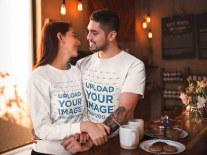Sweater and T-Shirt Mockup of a Man Hugging His Girlfriend