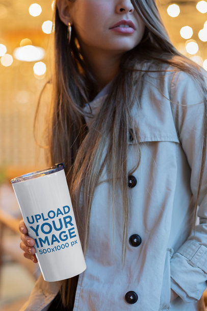 Mockup of a Pretty Woman With Long Hair Holding a Travel Mug