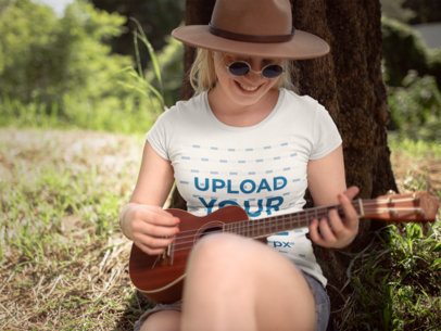 T-Shirt Mockup of a Woman Playing the Ukulele 21990