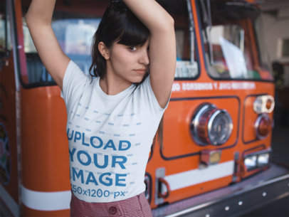 T-Shirt Mockup of a Woman Posing in Front of a Fire Truck