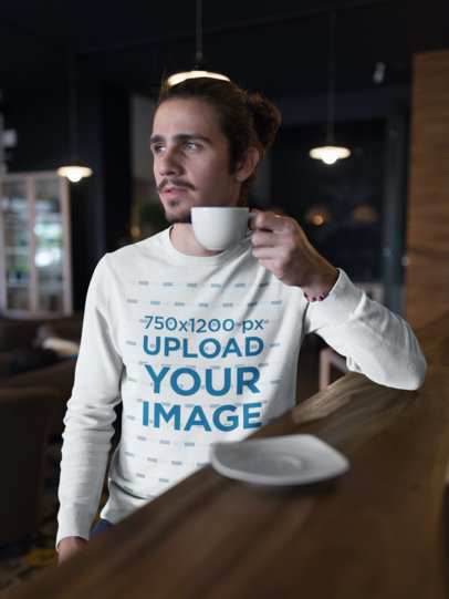 Sweatshirt Mockup of a Man Having a Coffee