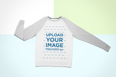 Mockup of a Long Sleeve Raglan Tee over a Colorful Background