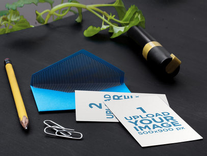 Mockup of an Open Envelope Lying Next to Some Office Supplies