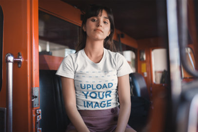 Tee Mockup of a Woman Sitting in a Red Fire Truck