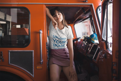 Tshirt Mockup of a Woman on a Fire Truck