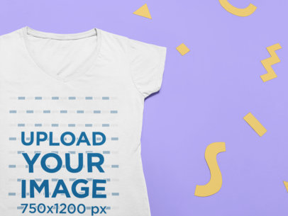 Mockup of a V-Neck Tee Lying Flat on a Surface
