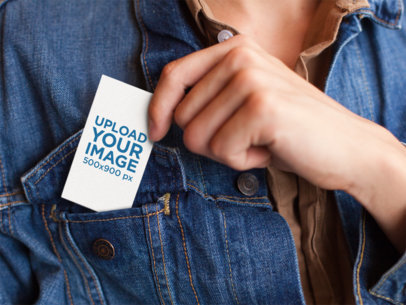 Mockup of a Woman Placing a Business Card in The Front Pocket