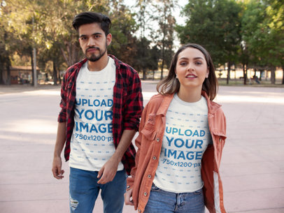 Mockup of a Fashionable Couple Wearing Tees