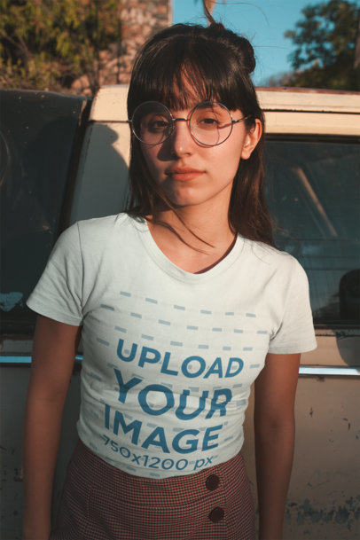 T-Shirt Mockup of a Woman with Round Glasses