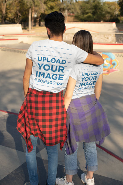 Back T-Shirt Mockup of a Couple Taking a Walk at a Skatepark 25236